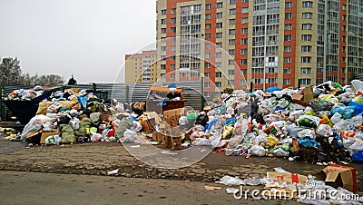 Huge pile of garbage near houses Editorial Stock Photo