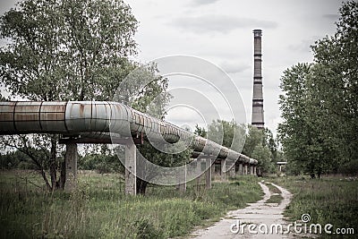 Huge pipes of the heating main above the ground Stock Photo
