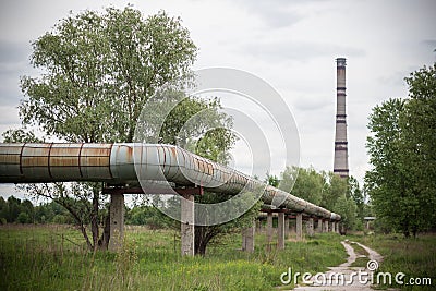 Huge pipes of the heating main above the ground Stock Photo