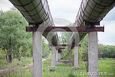 Huge pipes of the heating main above the ground Stock Photo