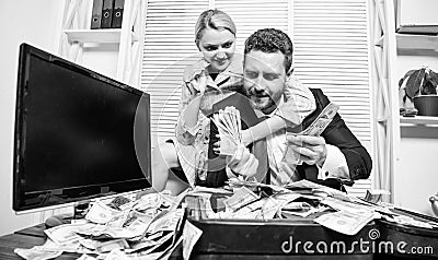 Huge profit concept. Financial success. Counting money profit. Man businessman and woman secretary with pile dollar Stock Photo