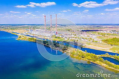 Huge river flowing near local power station aerial landscape Editorial Stock Photo