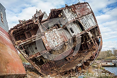 Huge rusty pieces of decommissioned marine ship. Stock Photo