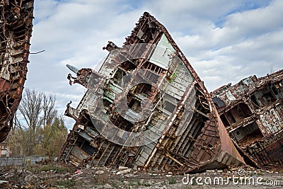 Huge rusty pieces of decommissioned marine ship. Stock Photo