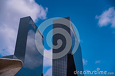 Huge skyscrapers in Rotterdam. Gebouw Delftse Poort a tall glassy building next to the central railway station Editorial Stock Photo