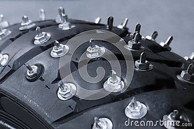Huge spikes on a motorcycle wheel close up Stock Photo