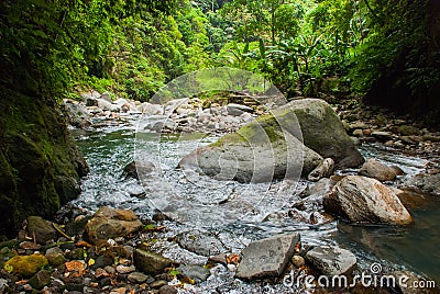 The huge stones near the waterfall Casaroro. Philippines. Valencia, island Negros. Stock Photo