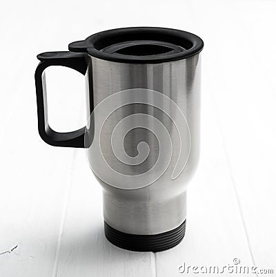 Huge thermocup with black comfortable handle Stock Photo