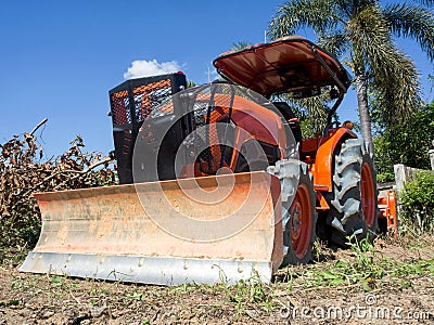 Huge tractor in the field Stock Photo