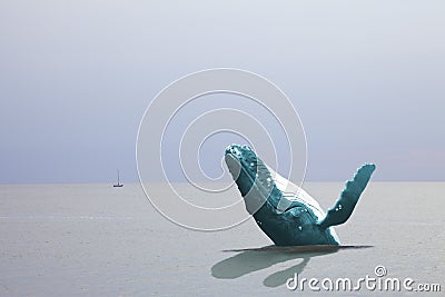 Huge whale at sea with ship Stock Photo