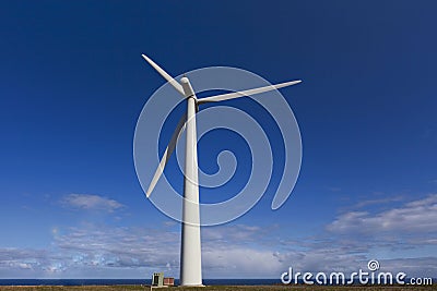 A huge wind turbine overlooking a landscape Editorial Stock Photo