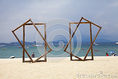 Huge wooden frame on the beach of wuzhizhou island, hainan province, China Editorial Stock Photo