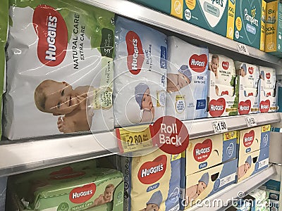 Huggies products on shelves of supermarket Editorial Stock Photo