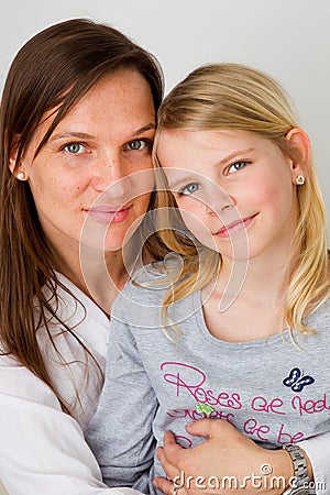 Hugging her daughter Stock Photo