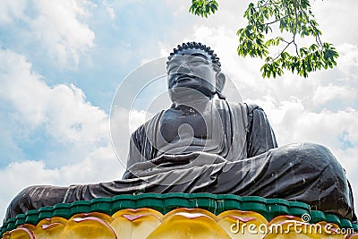 Hugh Buddha statue in Eight Trigram Mountains Buddha Landscape Stock Photo