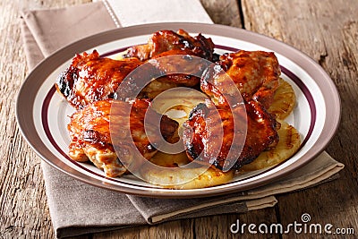 Huli-huli chicken is a grilled chicken dish in Hawaiian cuisine, prepared by barbecuing closeup. Horizontal Stock Photo