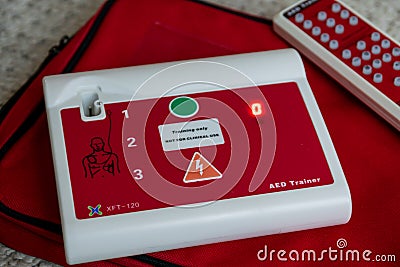 Hull, UK - 6 Feb 2022: Automated external defibrillator, AED machine. A portable life saving device that automatically diagnoses Editorial Stock Photo