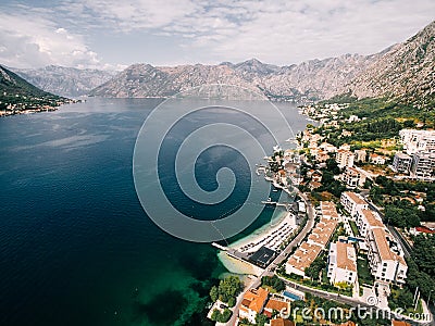 Huma Kotor Bay Hotel and Villas on the seashore. Dobrota, Montenegro. Drone Stock Photo