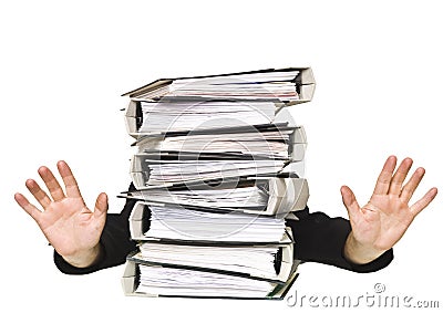 Human behind a stack of Ring Binders Stock Photo