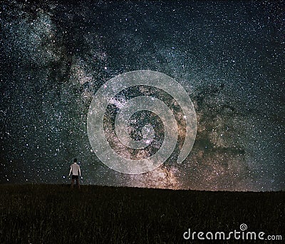 Human being looking to the Milky way galaxy core Stock Photo