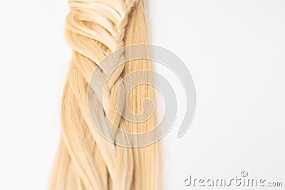 Human blond tress hair on isolated background Stock Photo