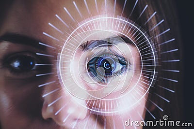 Human eye recognition face ID scanning process. Close up of white woman with digital interface. Stock Photo