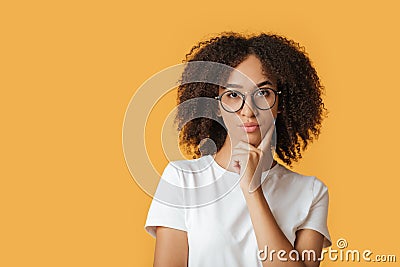 Human face expressions, emotions serious confident. Nice lady in glasses touch chin, look at camera Stock Photo