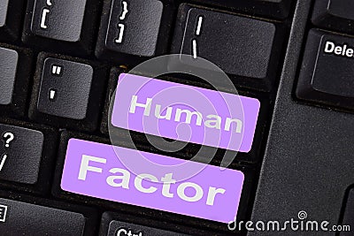 Human Factor write on keyboard isolated on laptop background Stock Photo