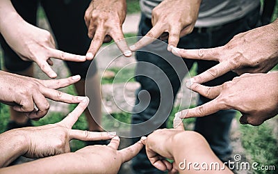 The human fingers touching together,sign and symbol of fighting and power of team,teamwork concept Stock Photo