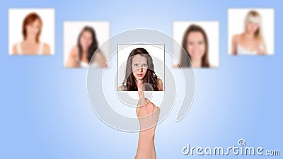 Human hand choosing from a portrait photo gallery on a touchscreen Stock Photo