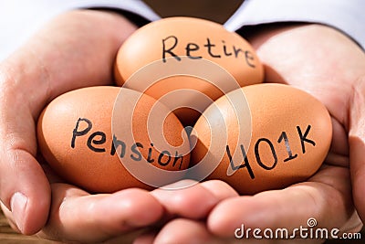 Human Hand With Egg Showing Pension And Retirement Text Stock Photo