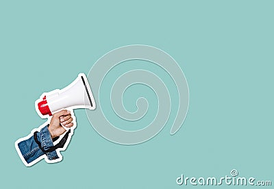 Human hand holding megaphone sticker with copy space Stock Photo