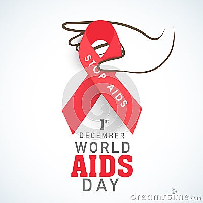 Human hand with red aids ribbon for World Aids Day concept. Stock Photo
