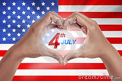 Human hand in shape of love with 4th of July text Stock Photo