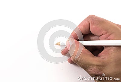 Human Hand and White Pencil Stock Photo