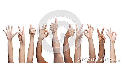 Human hands showing thumbs up, ok and peace signs Stock Photo