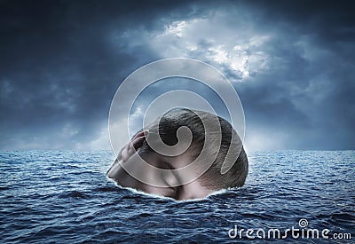 Human head in the sea Stock Photo