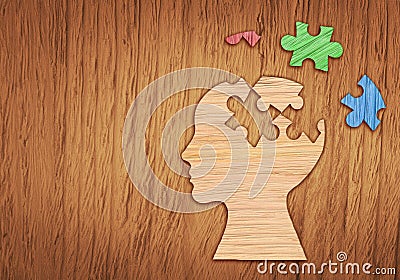 Human head silhouette, mental health symbol. Puzzle. Stock Photo