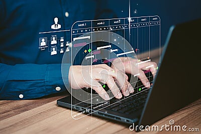 Human Resource working data analytics with computer in business management system to make report with KPI. Stock Photo