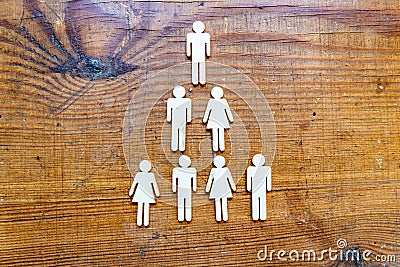 Human resources and corporate hierarchy concept - recruiter complete team by one leader person CEO represented by icon Stock Photo