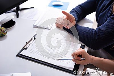 Human`s Hand With Contract Agreement Stock Photo