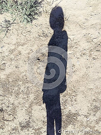The human shadow on earth Stock Photo