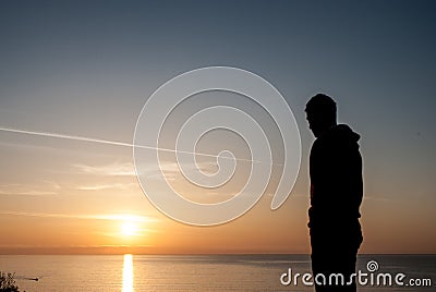 Human shape.Beautiful sunrise over the sea in Bulgaria Stock Photo