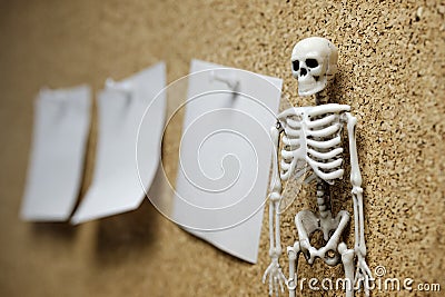 Human skeleton on the right side of the frame on the left side stickers for recordings on the wall in perspective Stock Photo