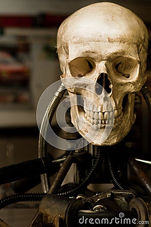 Human skull on robot body Stock Photo
