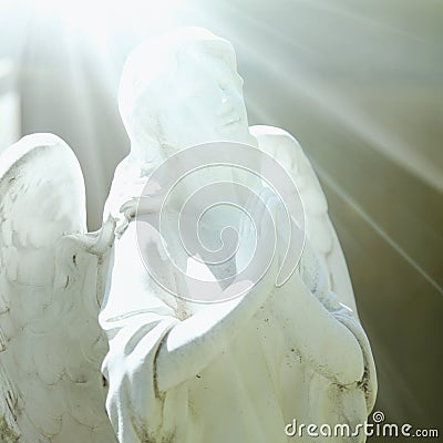 Human soul with wings in the rays of light. Symbolic photography. Angel, Christianity, religion, death concept Stock Photo