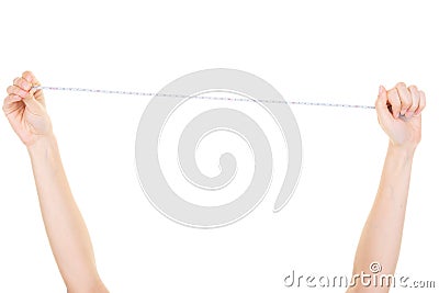 Human woman hand stretching a measure tape Stock Photo