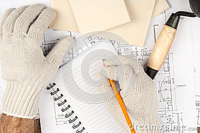 Humans hand writing in pad Stock Photo