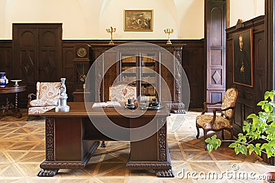 Antique office with carved wood furniture from the 18th century. Editorial Stock Photo