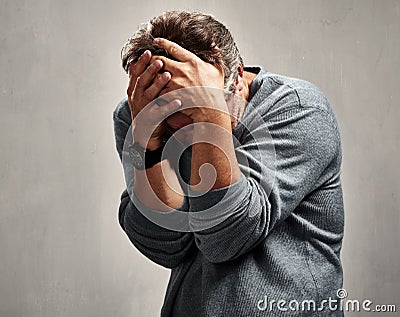 Humiliated sad man Stock Photo